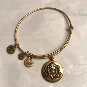 Gold Alex and Ani Lotus flower bracelet